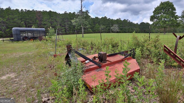 view of yard with a rural view