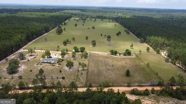 birds eye view of property with a rural view