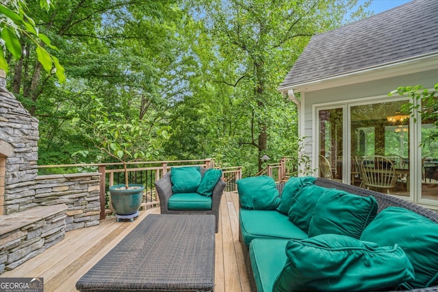 deck featuring outdoor lounge area