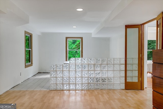 unfurnished living room with light wood-type flooring