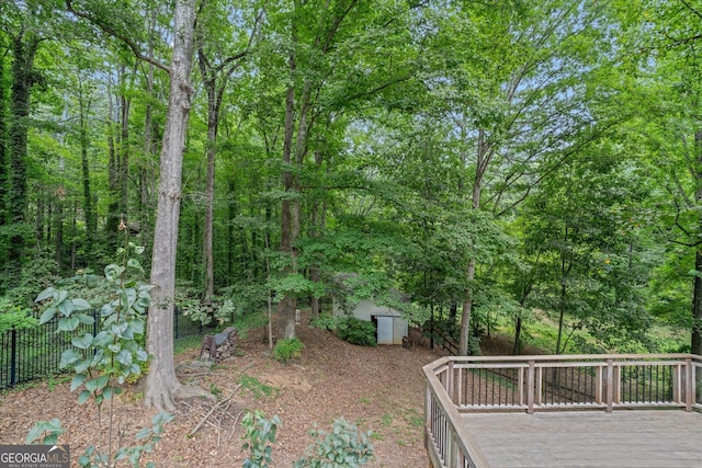 view of yard with a wooden deck