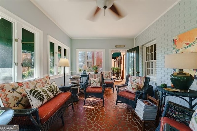 sunroom with french doors and ceiling fan