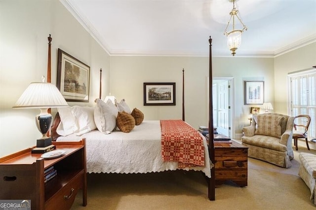 bedroom featuring crown molding and carpet