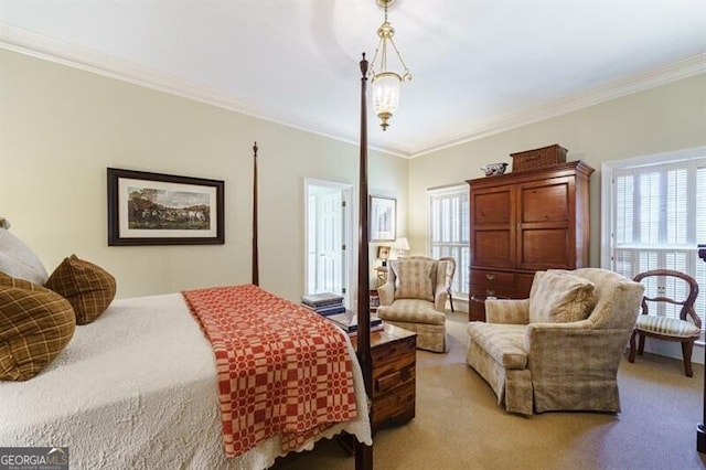 bedroom featuring carpet flooring, crown molding, and an inviting chandelier