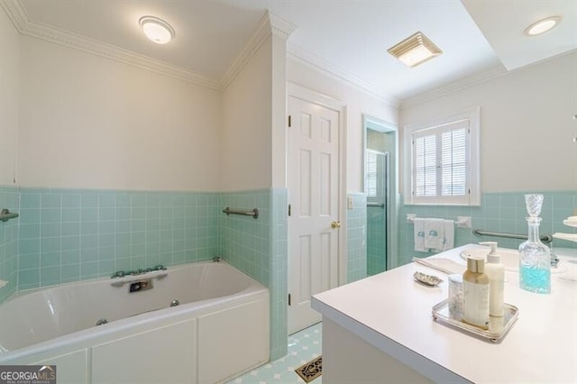 bathroom with vanity, tile walls, crown molding, a bathtub, and tile patterned flooring