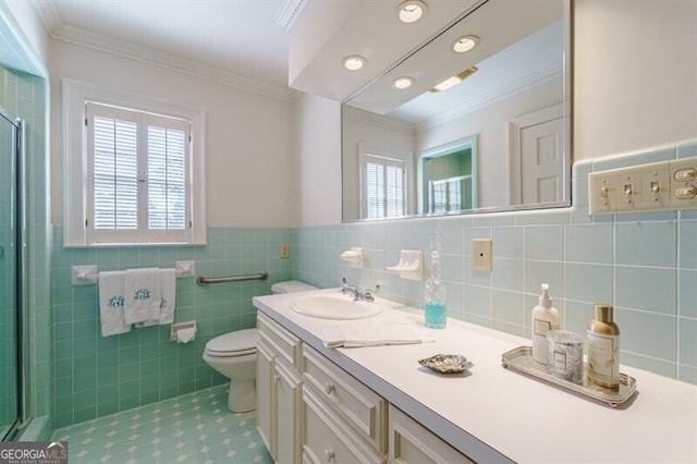 bathroom with tile patterned flooring, tasteful backsplash, toilet, vanity, and tile walls