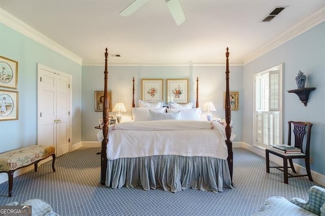 bedroom featuring ornamental molding, ceiling fan, and carpet flooring