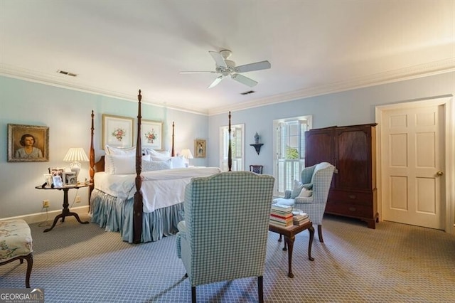 bedroom with carpet flooring, ceiling fan, and crown molding