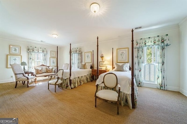 bedroom with carpet floors and ornamental molding