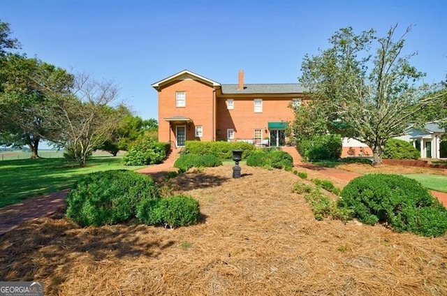 71 Taff Rd, Taylorsville, GA 30178 - back of house featuring a chimney