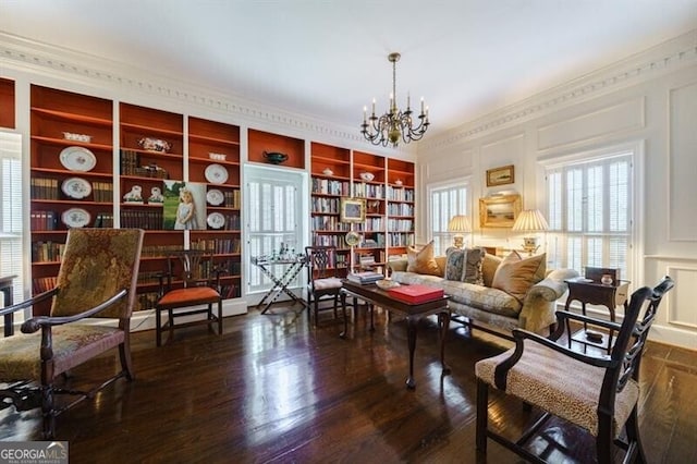 71 Taff Rd, Taylorsville, GA 30178 - sitting room with a chandelier, wood finished floors, and built in shelves