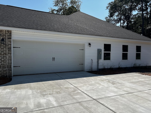 exterior space with a garage