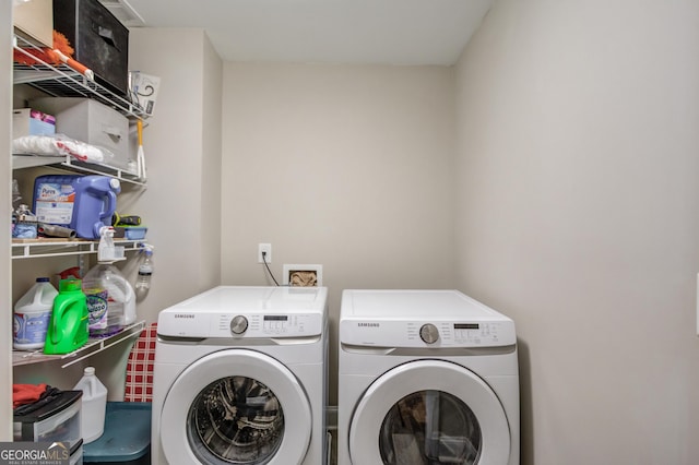 laundry room featuring washer and clothes dryer