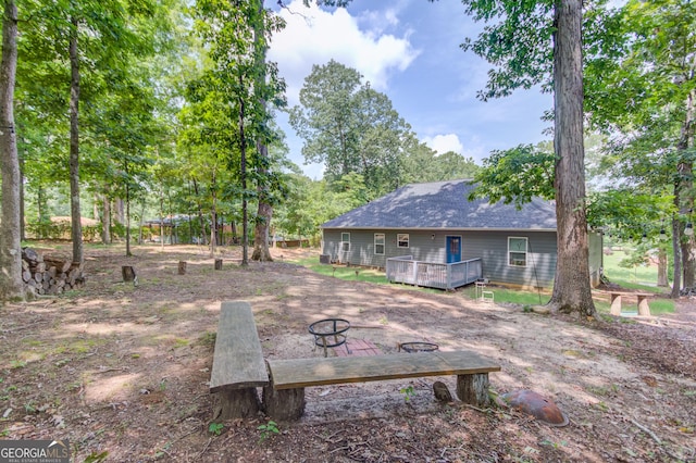 view of yard featuring a deck