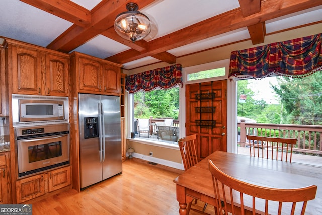 kitchen featuring stainless steel appliances, coffered ceiling, light wood-type flooring, and beam ceiling