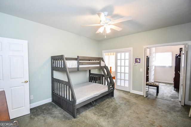 carpeted bedroom with multiple windows