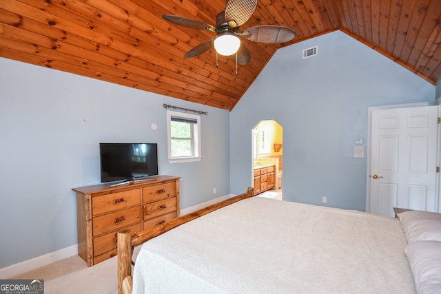 carpeted bedroom featuring wood ceiling, ensuite bath, high vaulted ceiling, and ceiling fan