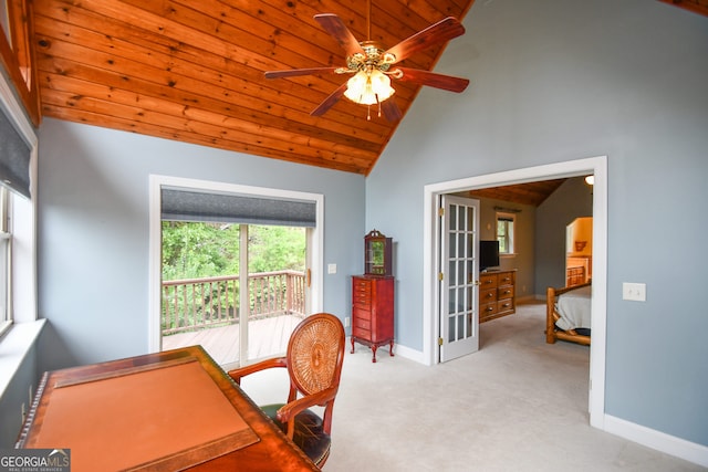 office space featuring lofted ceiling, wood ceiling, ceiling fan, light carpet, and french doors