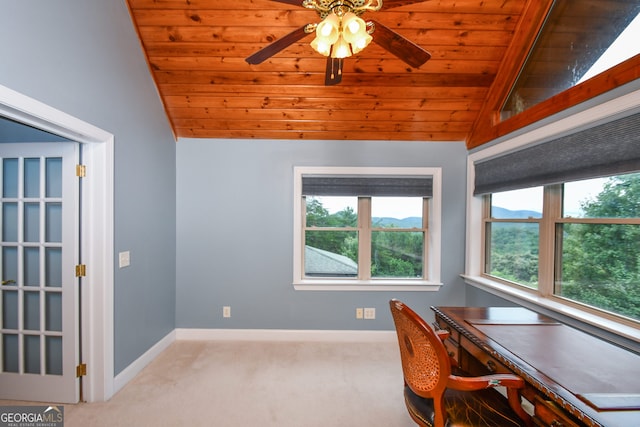 carpeted office featuring wood ceiling, vaulted ceiling, and ceiling fan