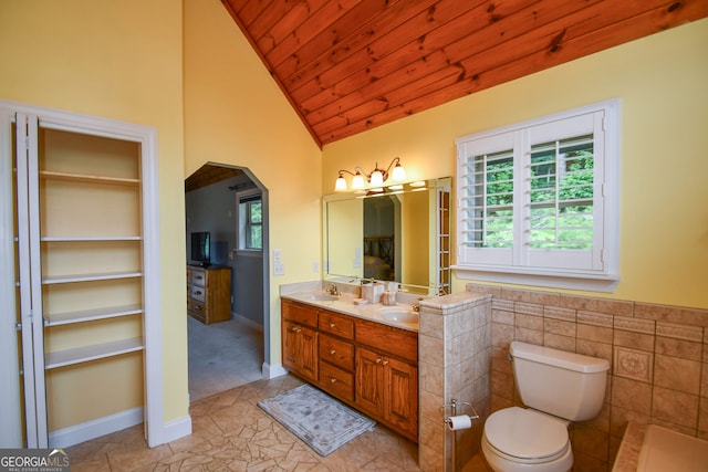 bathroom featuring vanity, vaulted ceiling, wooden ceiling, and toilet