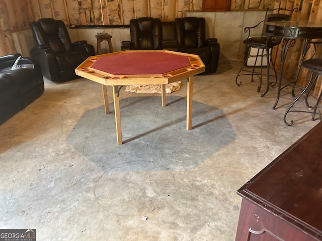 playroom with concrete flooring