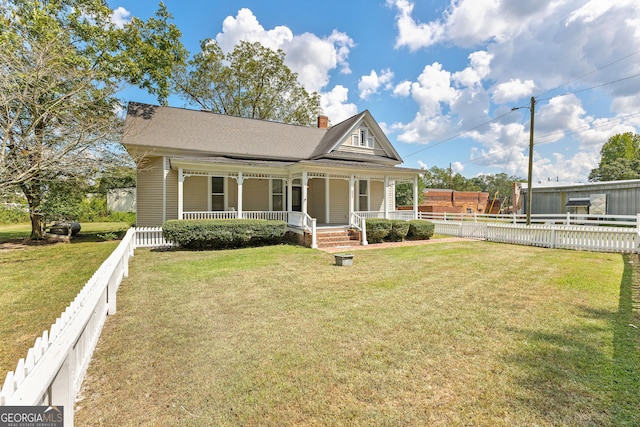 view of front of house with a porch and a front lawn