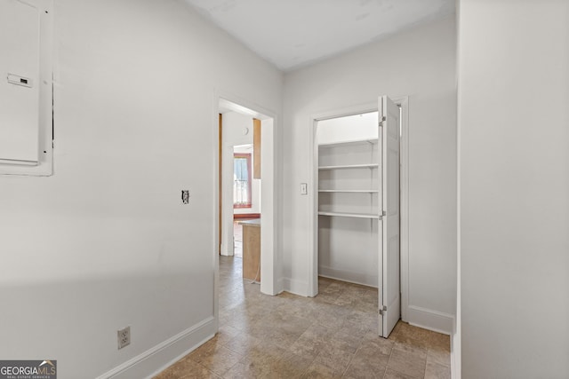 hallway with electric panel