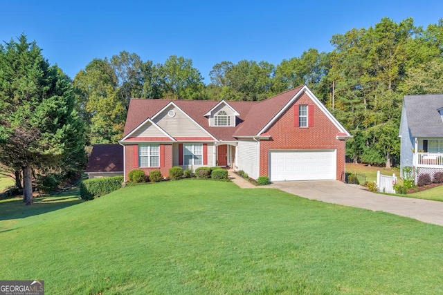 view of front of property featuring a garage and a front yard