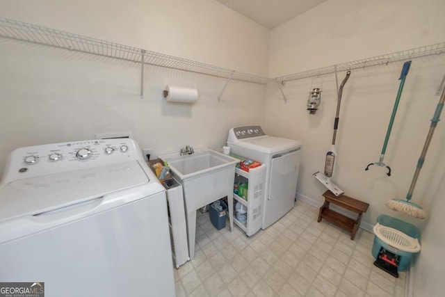 washroom featuring independent washer and dryer