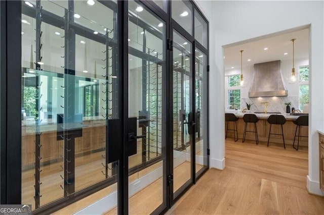 entryway with light hardwood / wood-style flooring