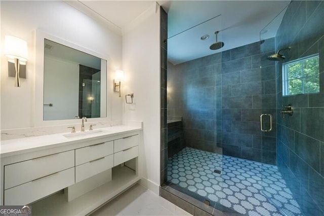 bathroom with an enclosed shower and vanity