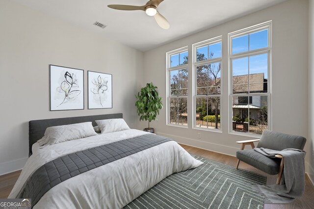 spare room featuring ceiling fan and light wood-type flooring