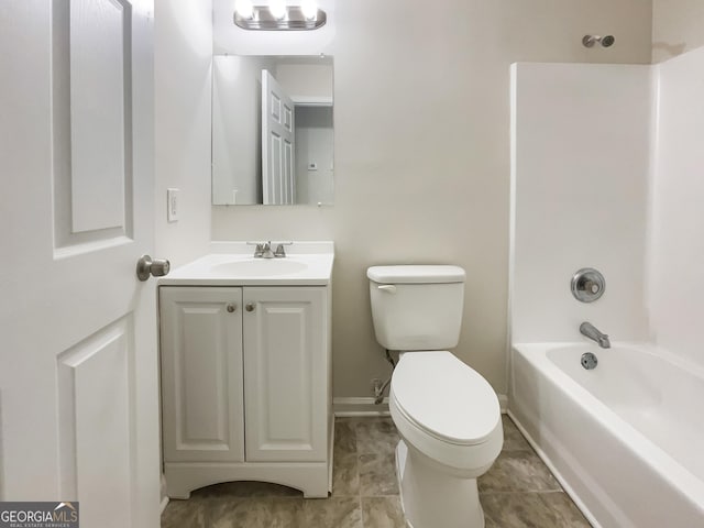 full bathroom featuring toilet, vanity, and shower / bathtub combination