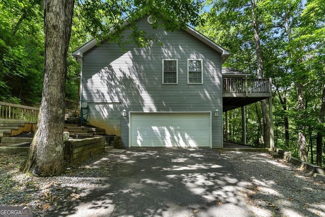 view of property exterior featuring a garage