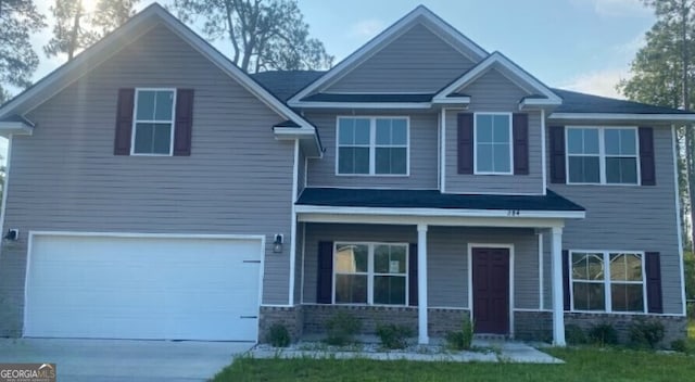 view of front of home featuring a garage