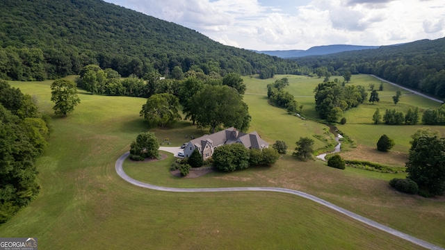 drone / aerial view with a rural view and a mountain view