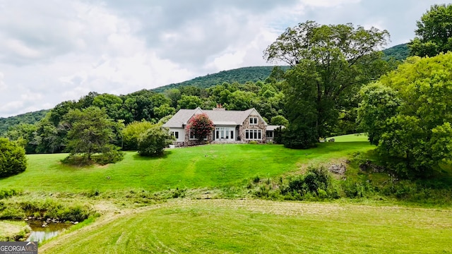 exterior space featuring a mountain view