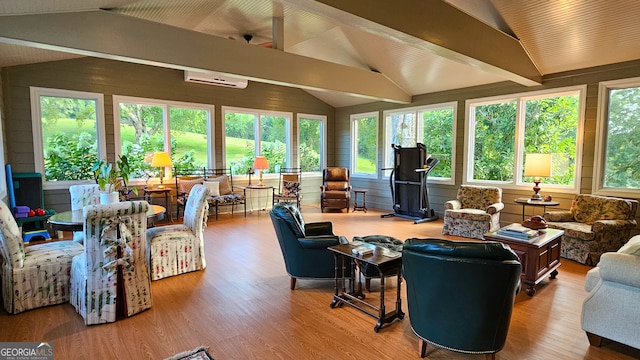 sunroom featuring a wall mounted air conditioner and lofted ceiling with beams