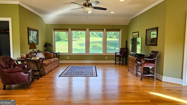 interior space with lofted ceiling and ceiling fan