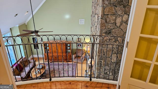 interior space featuring ceiling fan