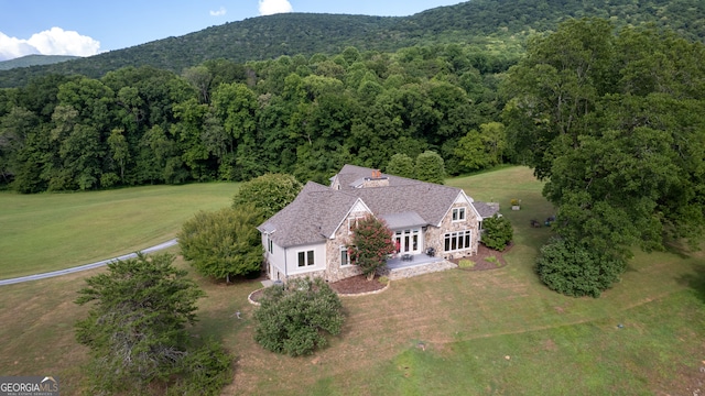 drone / aerial view featuring a mountain view