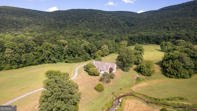 bird's eye view with a mountain view