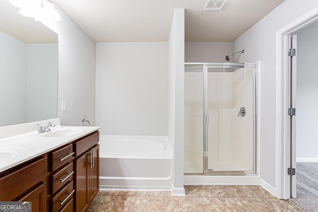 bathroom featuring vanity and plus walk in shower