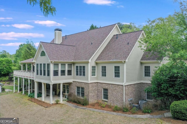 back of house with a patio area