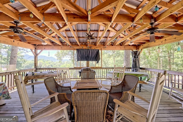 208 Colony Rd, Dillard, GA 30537 - wooden terrace featuring a ceiling fan, outdoor dining area, a mountain view, and a gazebo