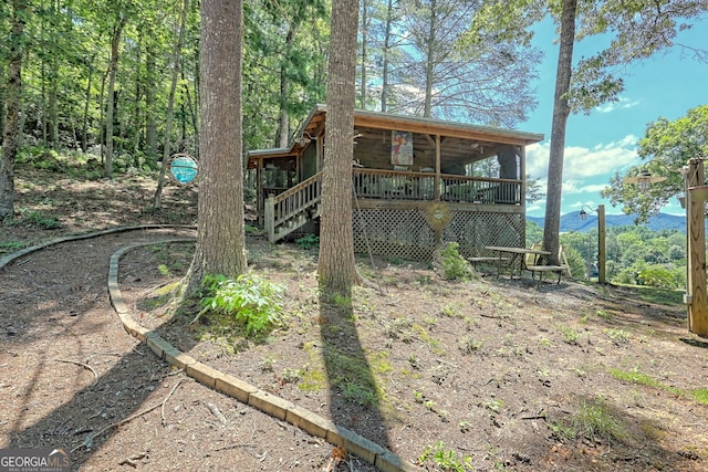 back of property with a deck