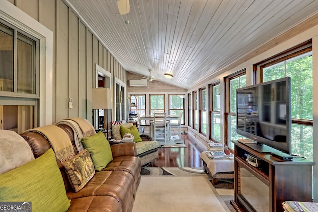 sunroom / solarium with wooden ceiling, a healthy amount of sunlight, vaulted ceiling, and ceiling fan