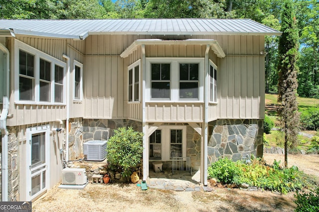 back of property with cooling unit