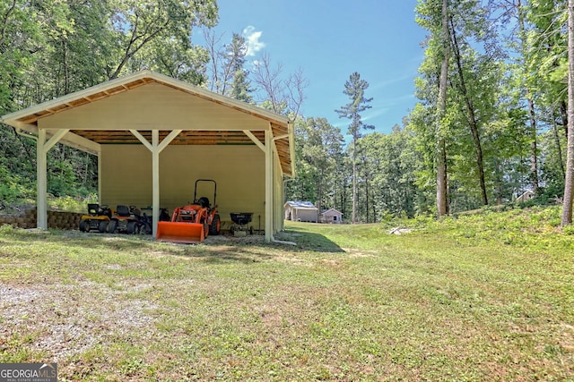 208 Colony Rd, Dillard, GA 30537 - view of grassy yard with a detached carport