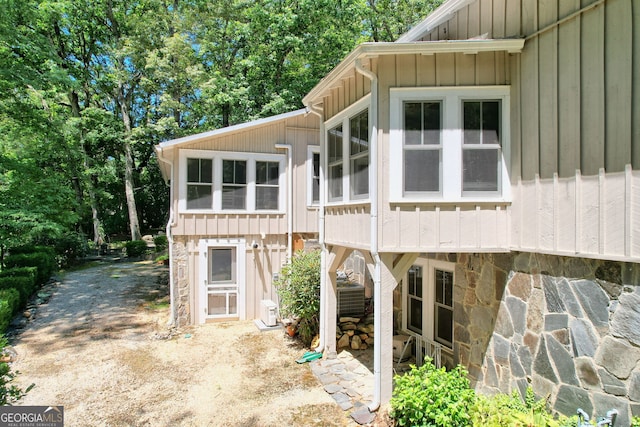 208 Colony Rd, Dillard, GA 30537 - view of side of home with board and batten siding and stone siding